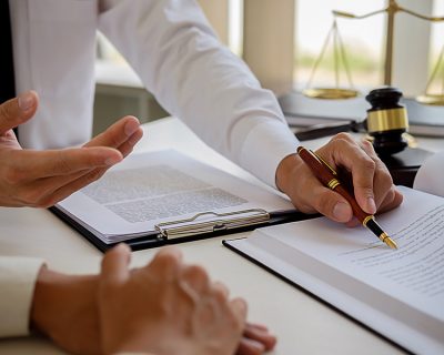 accident lawyer at desk with client reviewing paperwork natick ma accident lawyer at desk with client reviewing paperwork natick ma