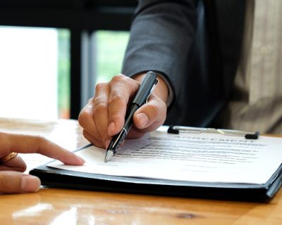 lawyer reviewing paperwork with client revere ma lawyer reviewing paperwork with client revere ma